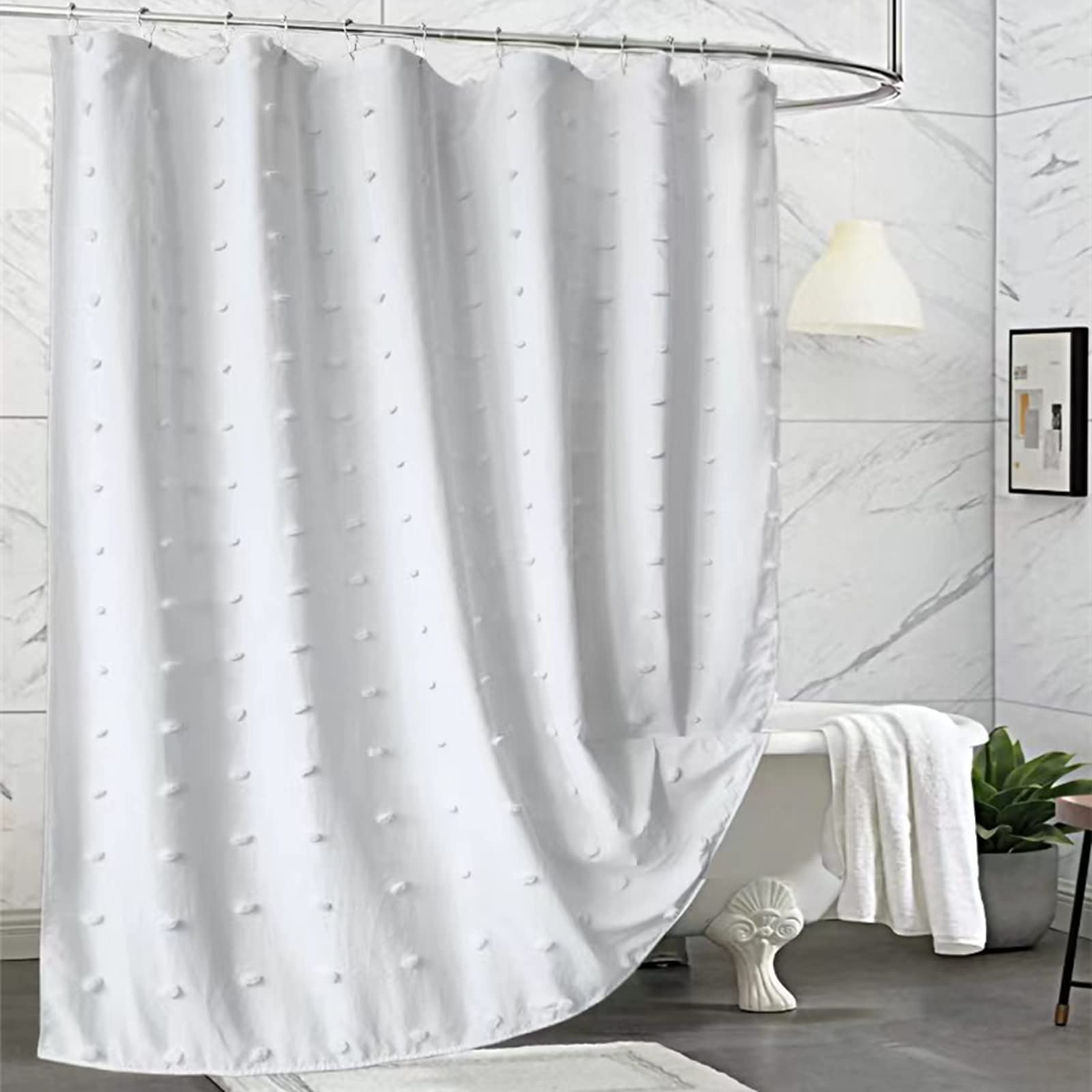 white fabric shower curtain