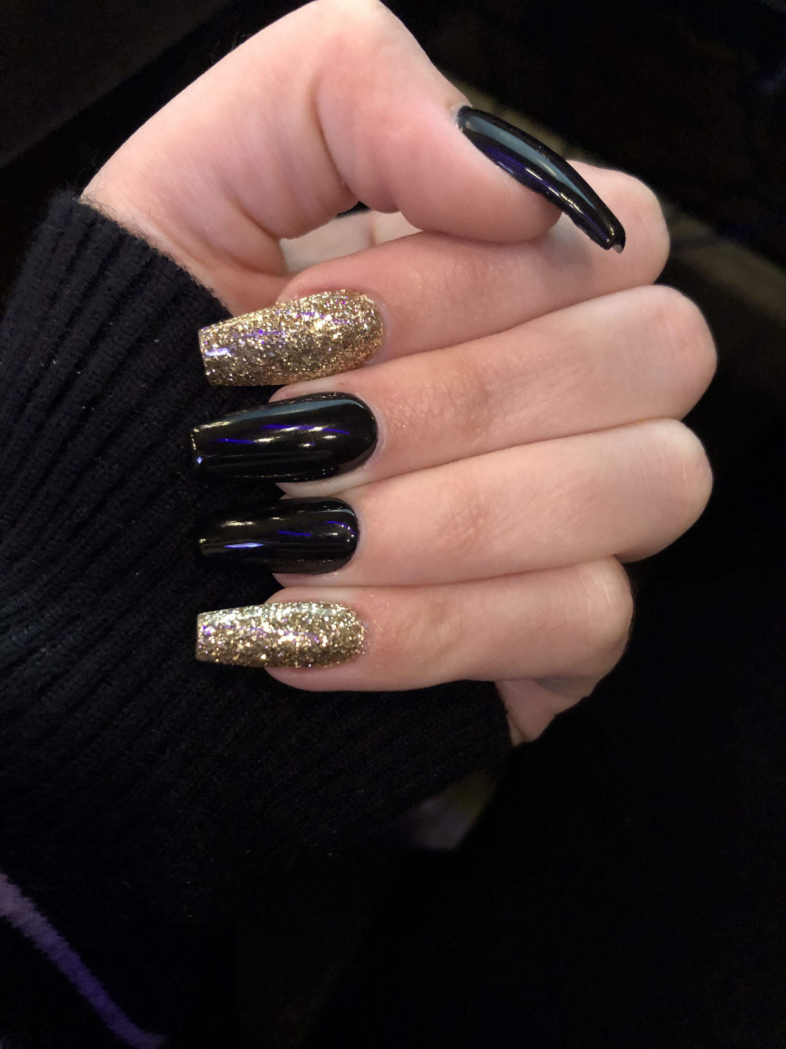 black with gold nails