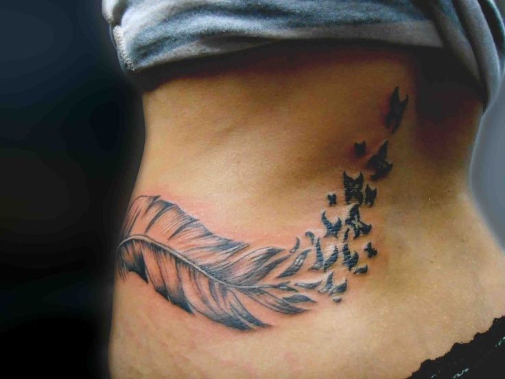 feather tattoo with butterflies