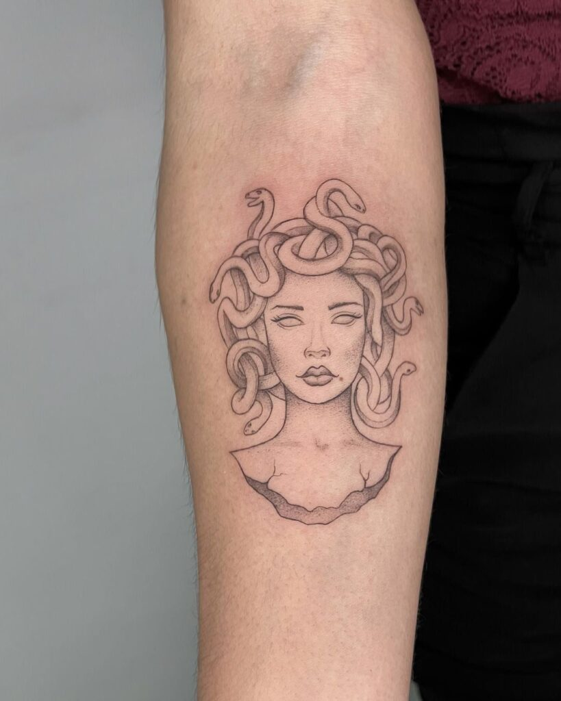 minimalist simple medusa tattoo