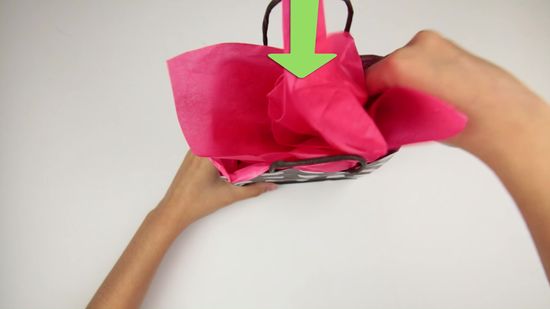 how to put tissue paper in a gift bag