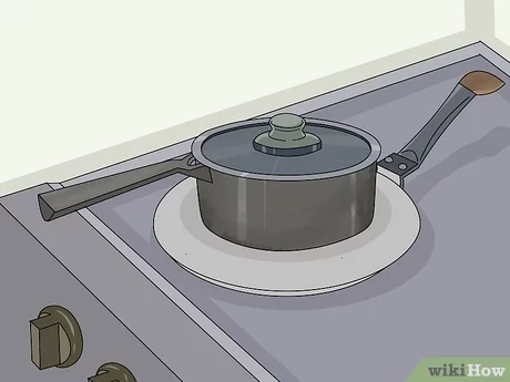 how to protect glass top stove from cast iron