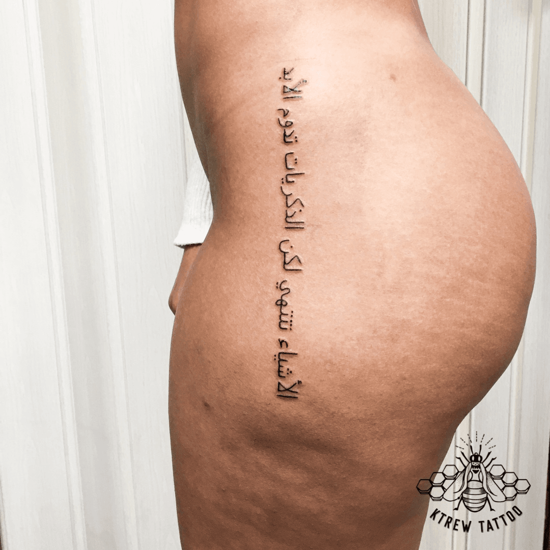 lettering tattoo leg