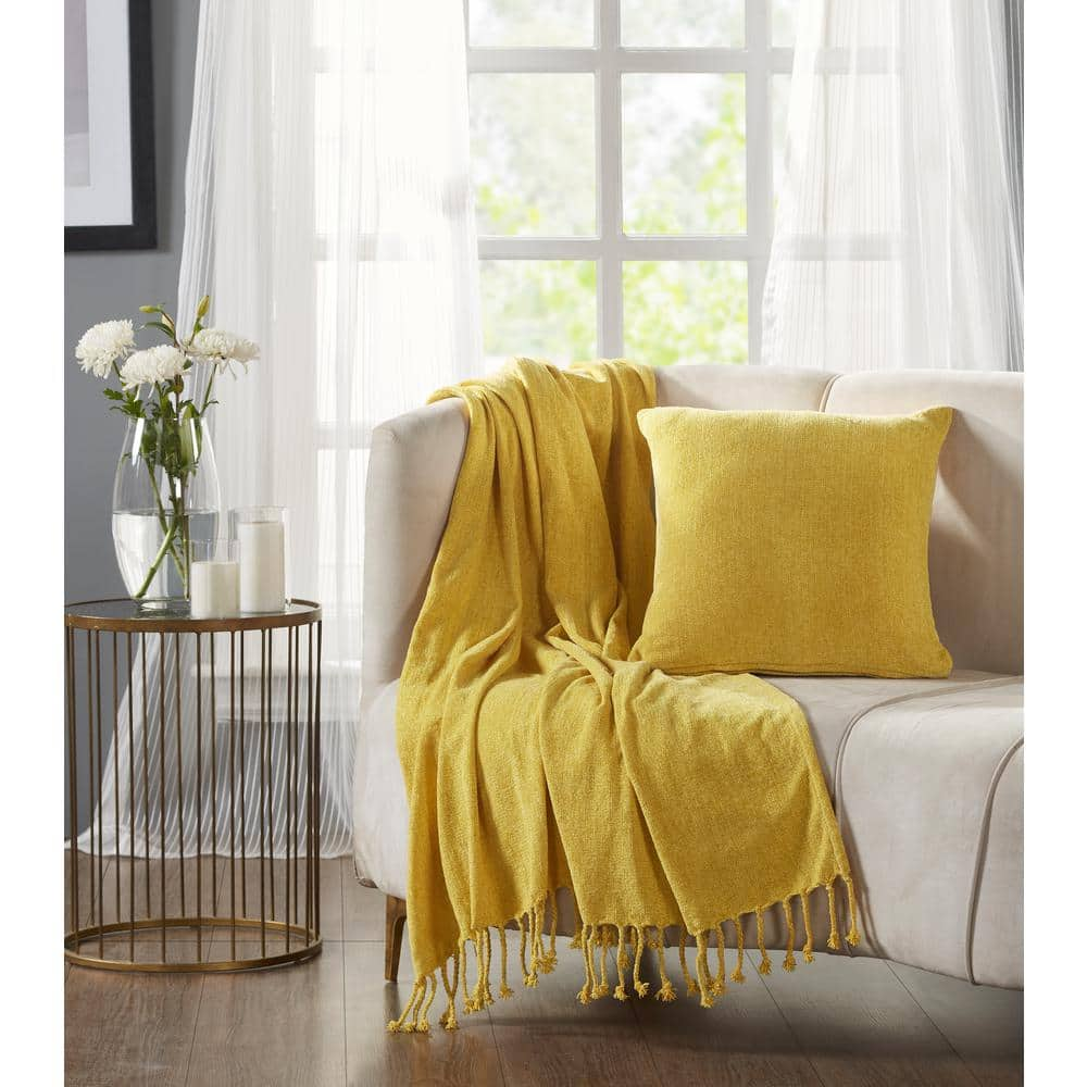 yellow pillows and throws