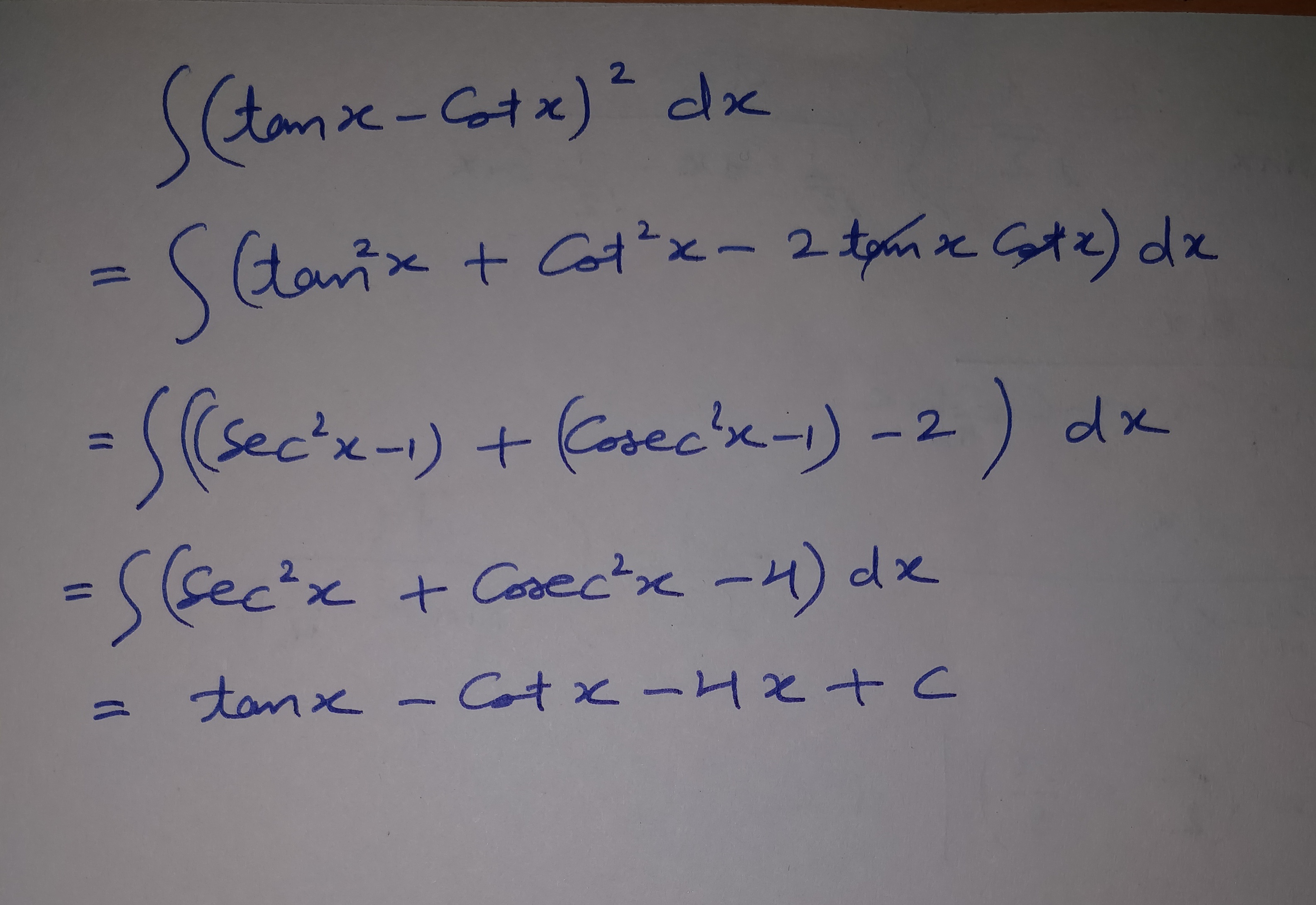 integration of tanx cotx