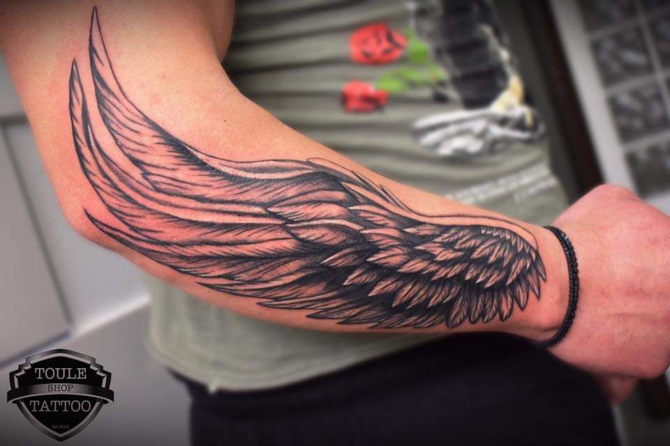 tattoo wings on arms