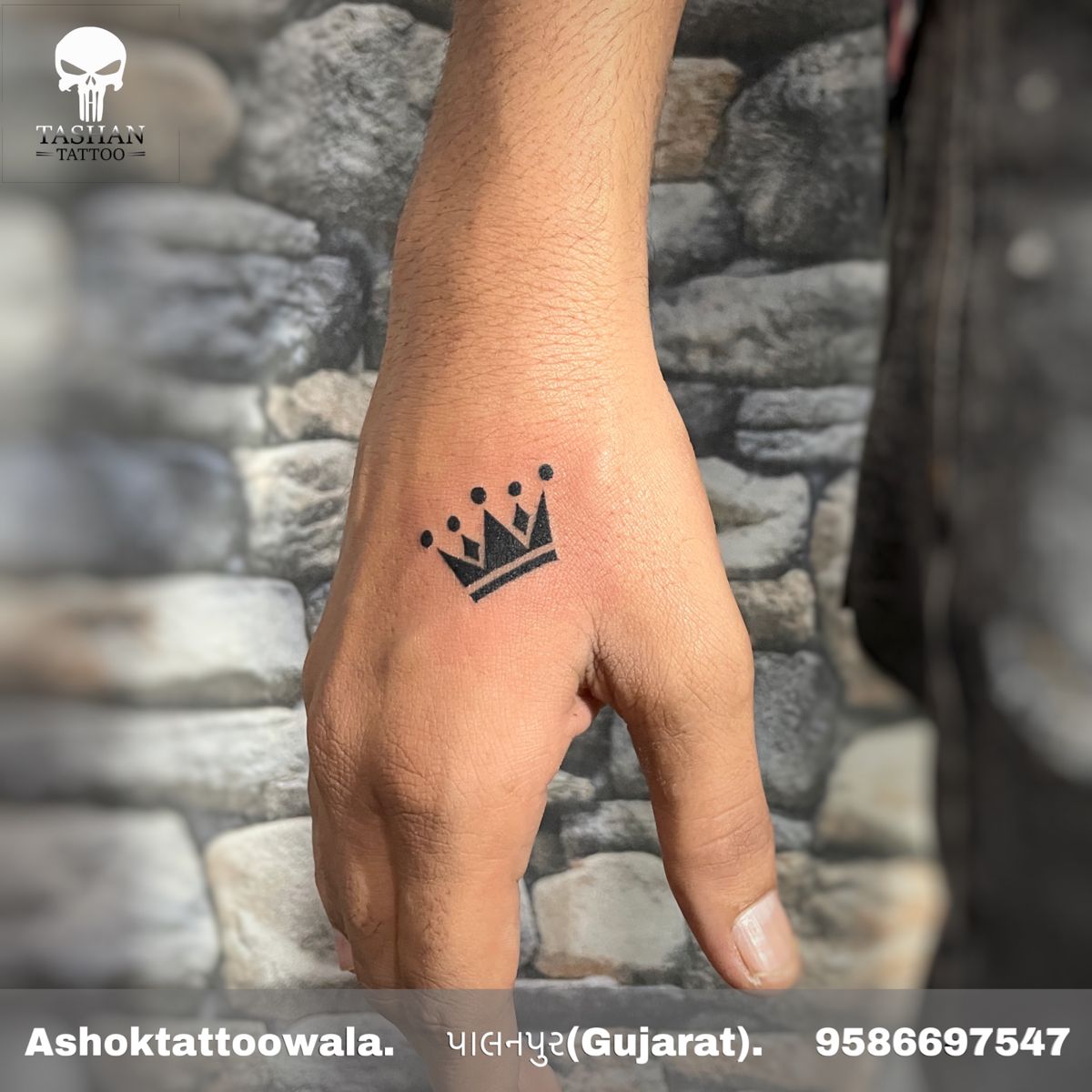 crown tattoo on hand