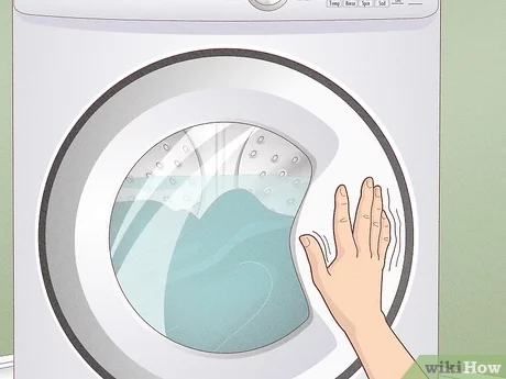 how to unlock indesit washing machine door