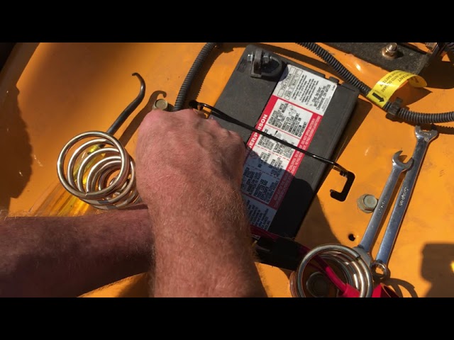 how to remove battery from cub cadet riding mower