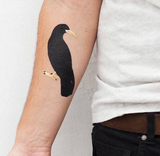 golden crow tattoo