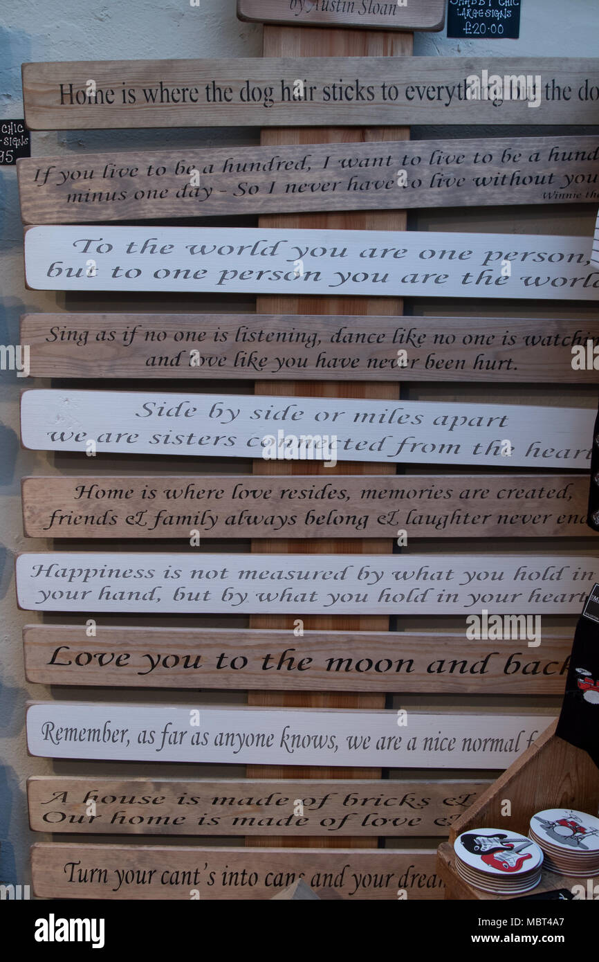 long wooden plaques with quotes