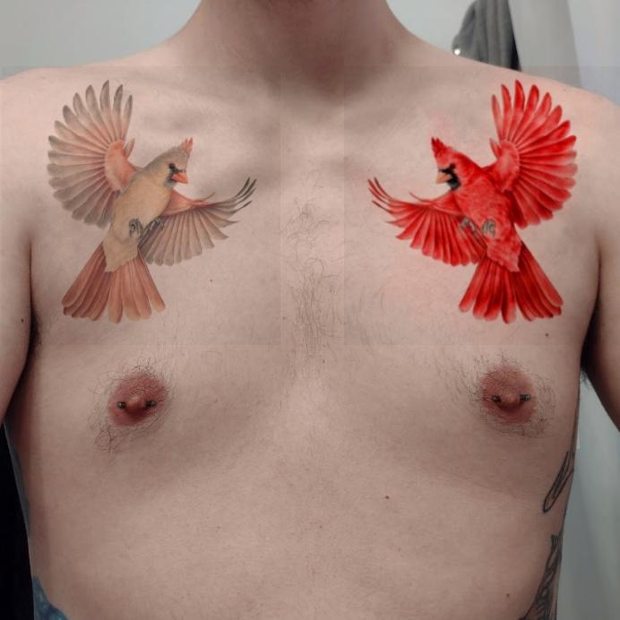 bird chest tattoo