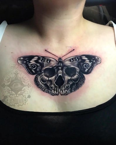 butterfly with skull tattoo