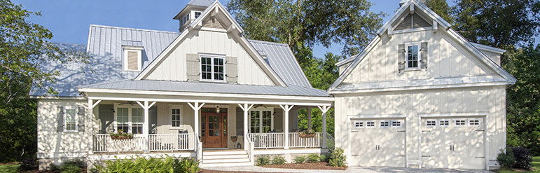 farmhouse with detached garage