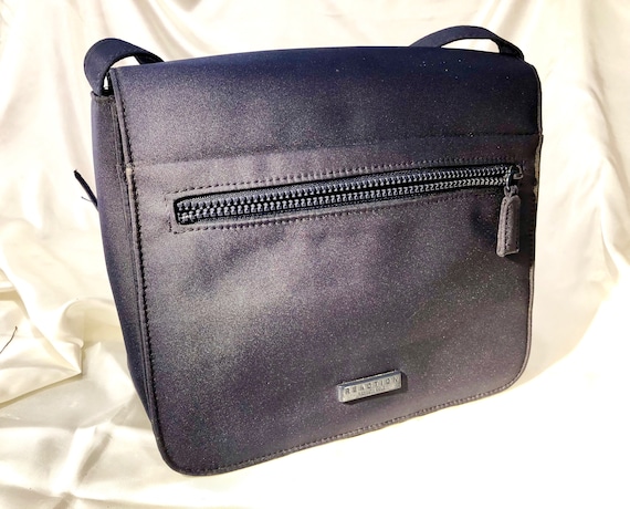 bolsa kenneth cole reaction