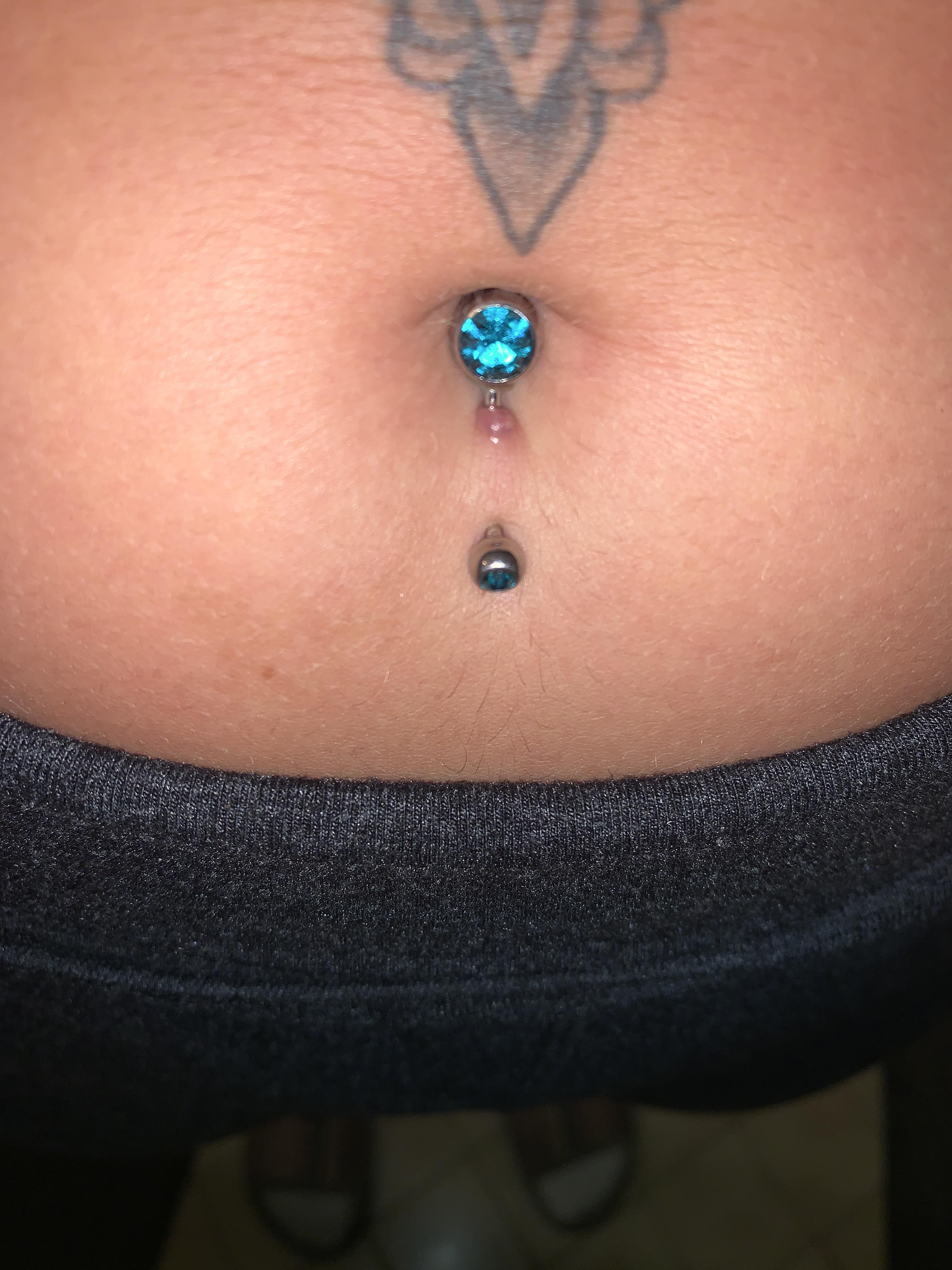 bottom navel piercing