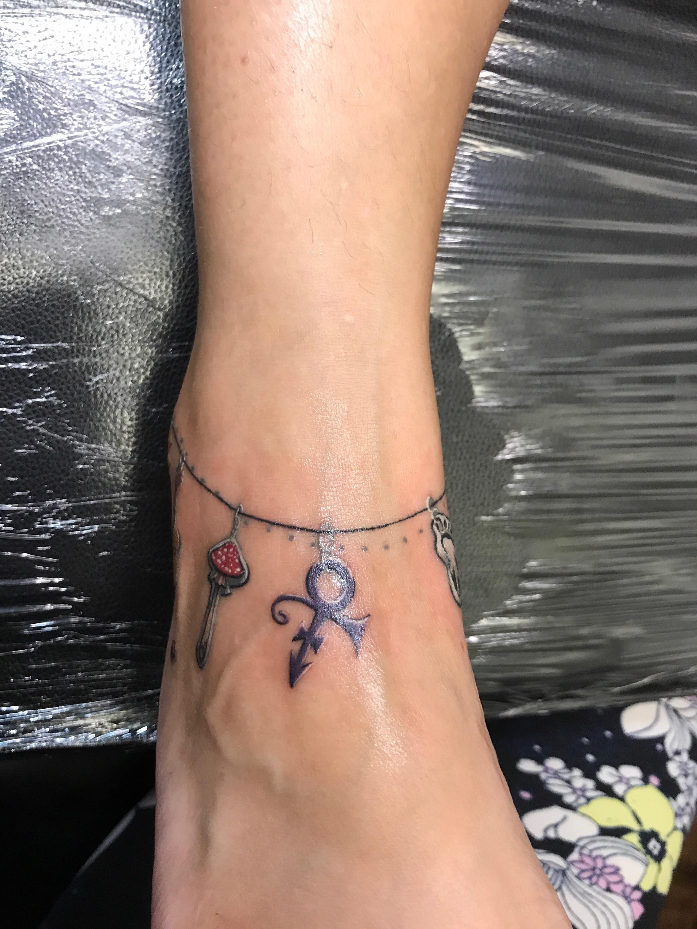 charm bracelet tattoo