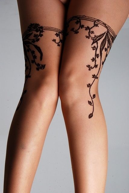 classy thigh band tattoos for females