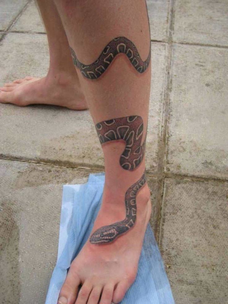 cobra tattoo on leg