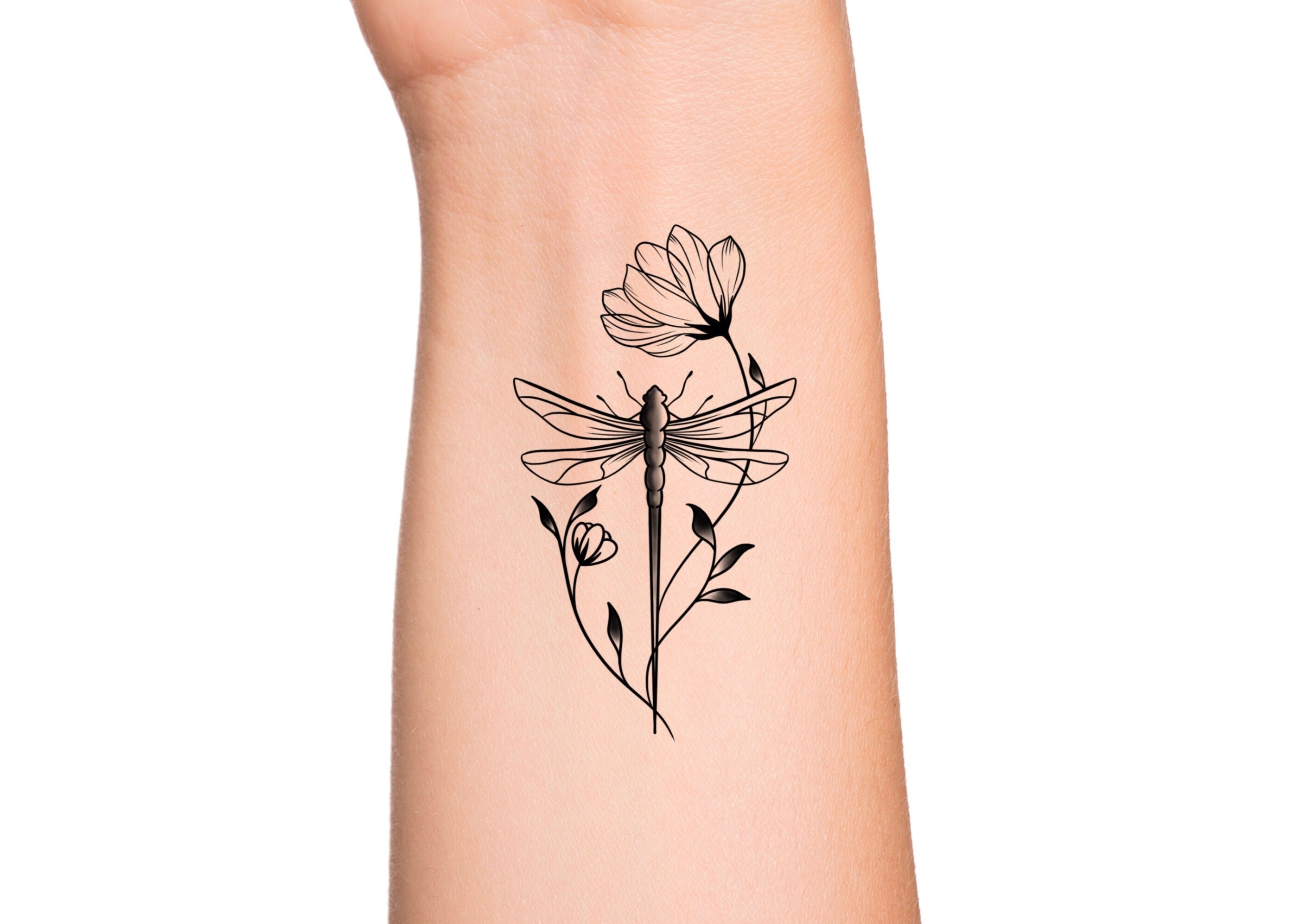 dragonfly on flower tattoo