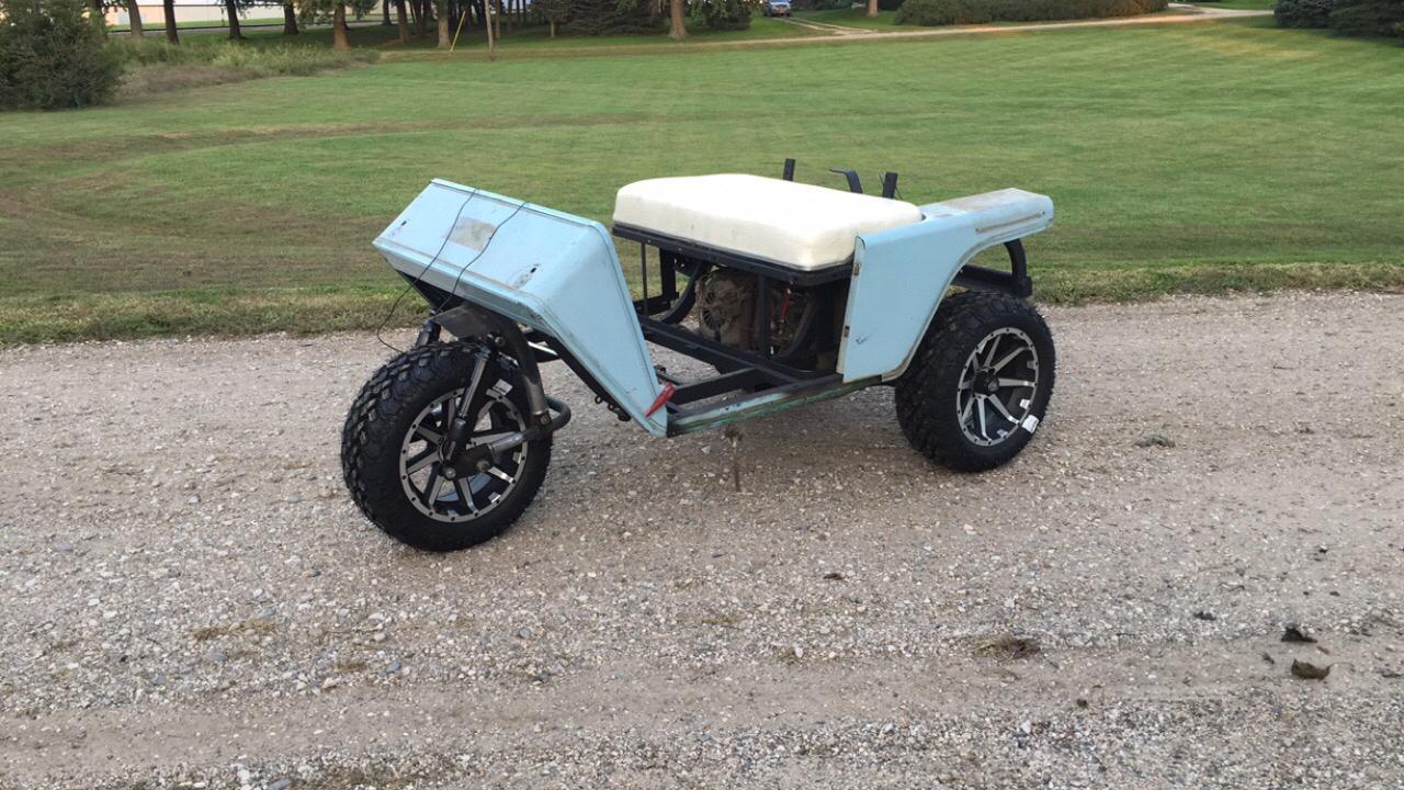 lifted 3 wheel golf cart