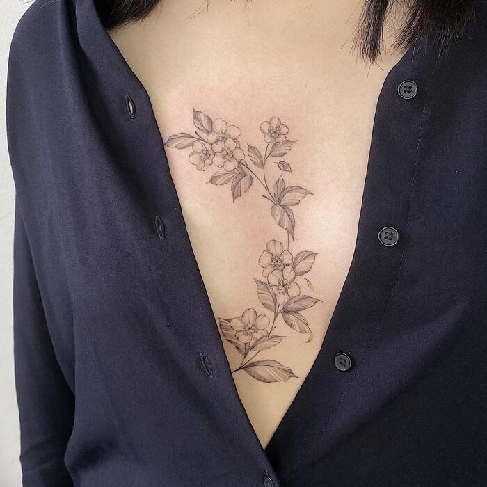 sternum tattoo floral