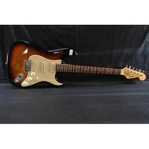 sunburst strat cream pickguard