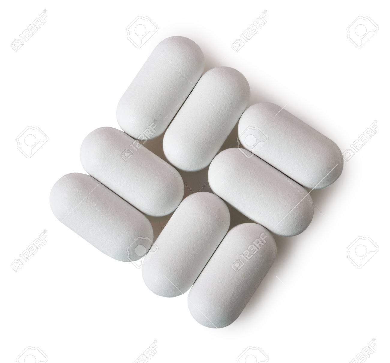 white elliptical pill